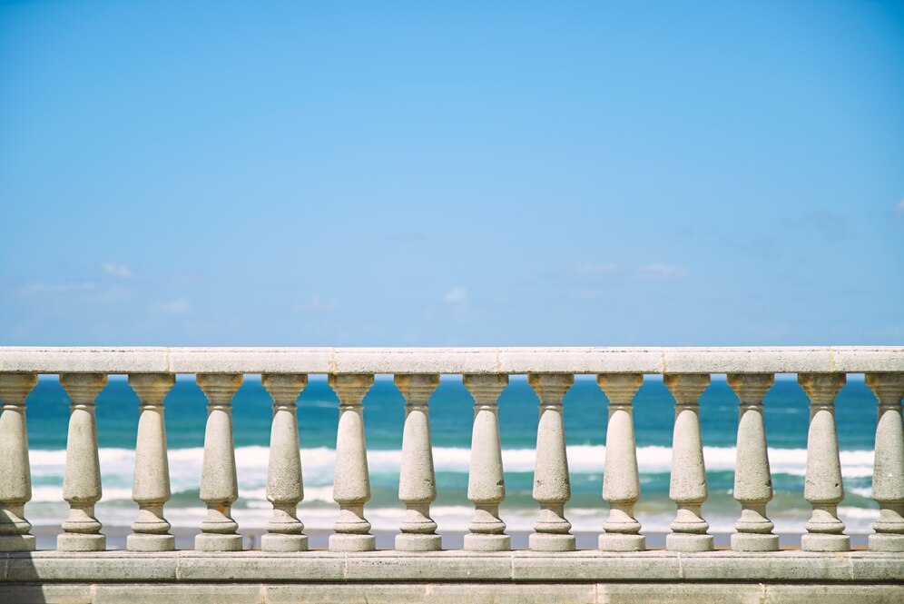 concrete-pillar-fence-blue-sky_346278-1289
